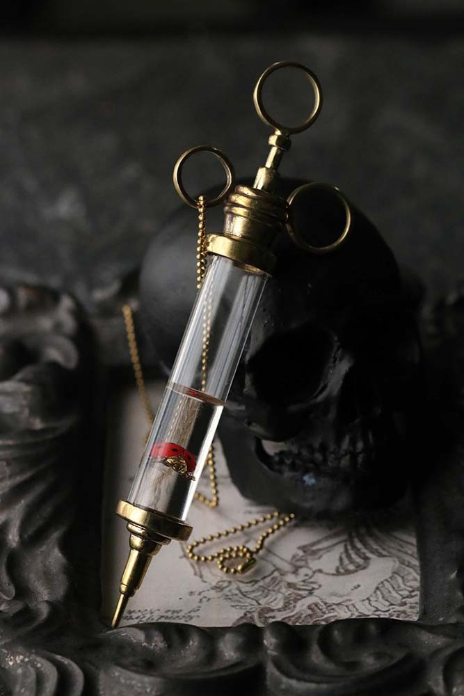 defy-necklace-ladybug-syringe1